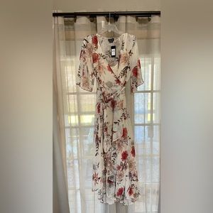 City Chic Plus Size Wrap Dress. Size 18 (M). New with tags. High/Low hemline.